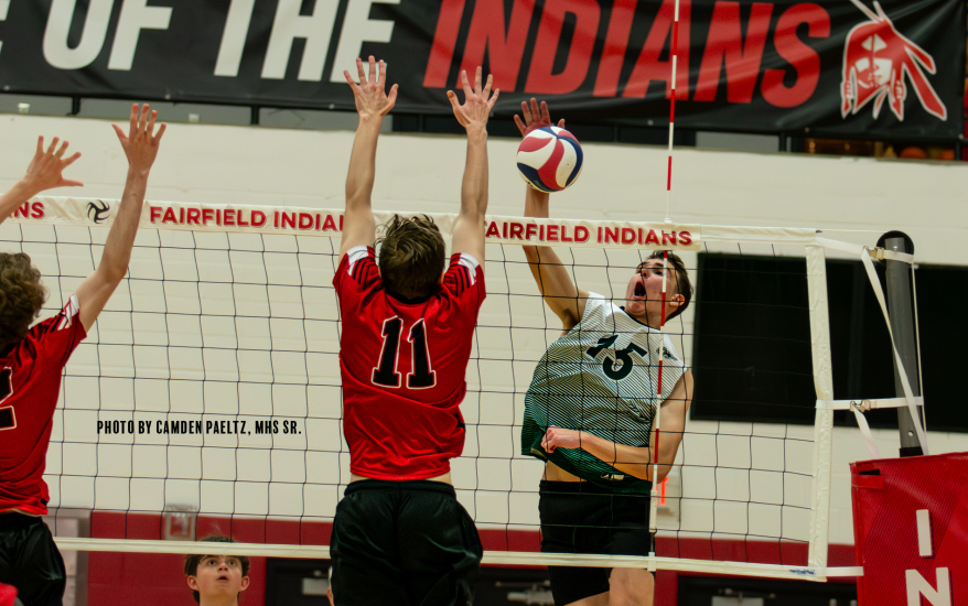 boys playing volleyball